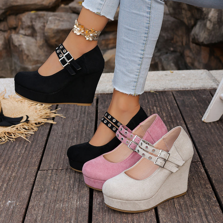 Wedge shoes with metal heart clasp