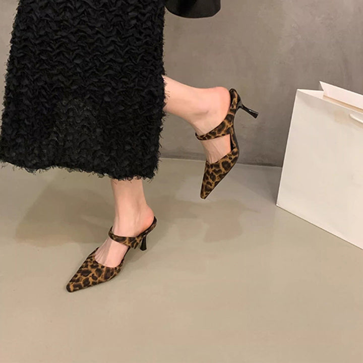 French-style pointed-toe high-heeled mules