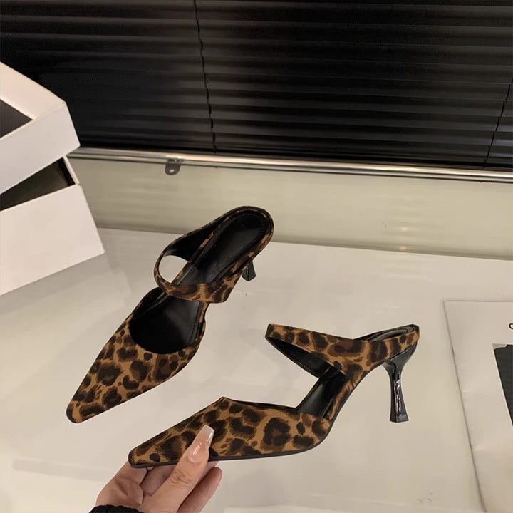 French-style pointed-toe high-heeled mules