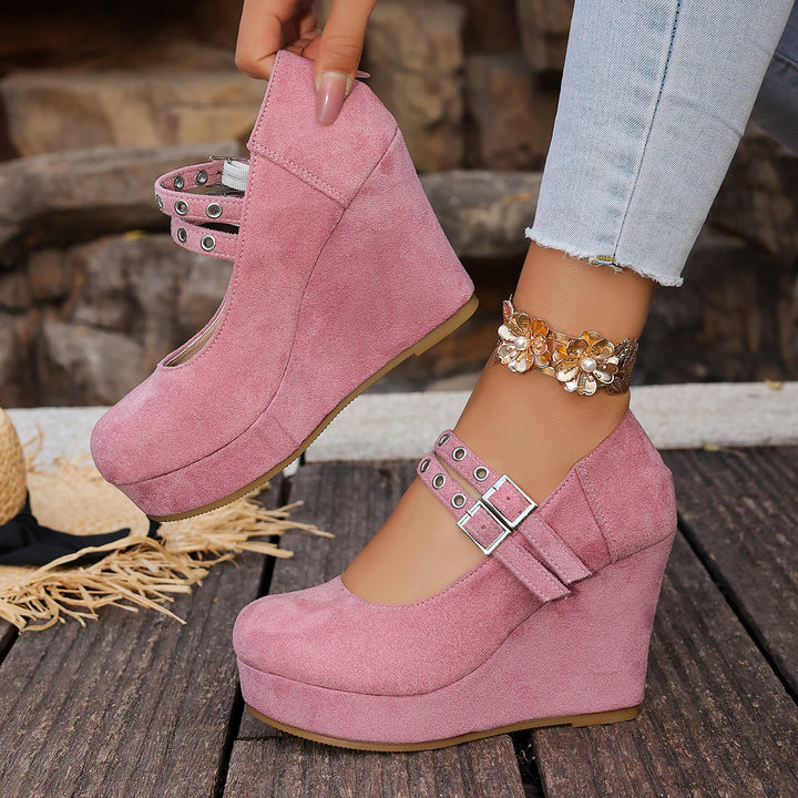 Wedge shoes with metal heart clasp