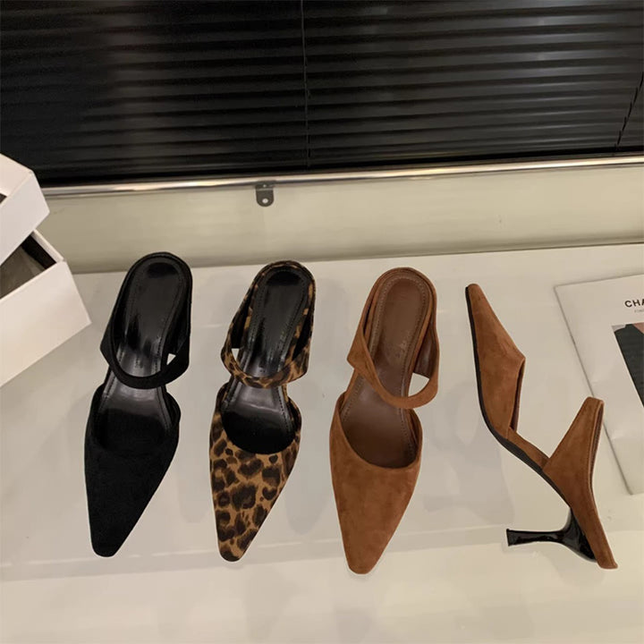 French-style pointed-toe high-heeled mules