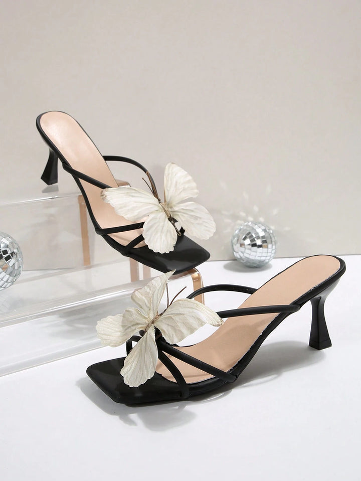 Butterfly-decorated high-heeled sandals