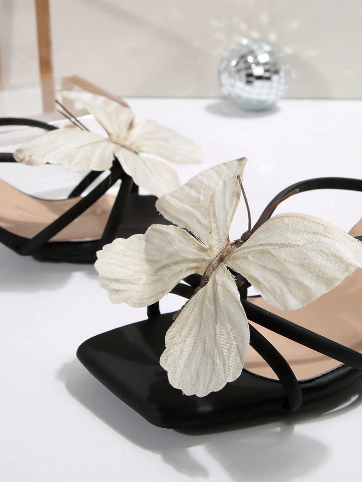 Butterfly-decorated high-heeled sandals