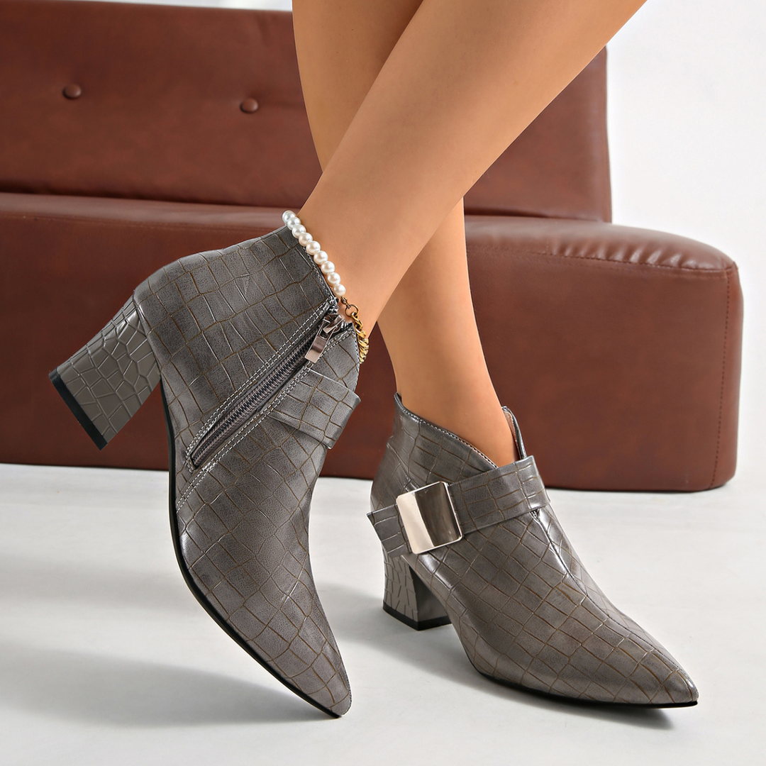 Pointed-toe block-heel ankle boots with metal buckles