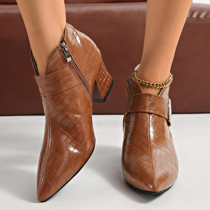 Pointed-toe block-heel ankle boots with metal buckles