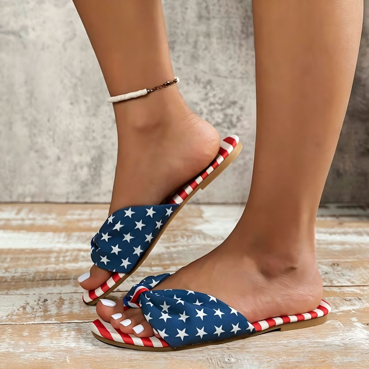 Star-and-striped knot-decorated flat sandals