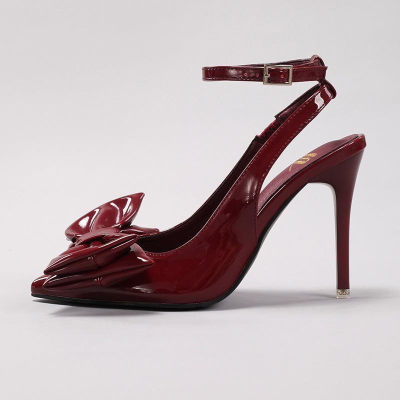 Bow-tie patent leather pointed-toe high heels