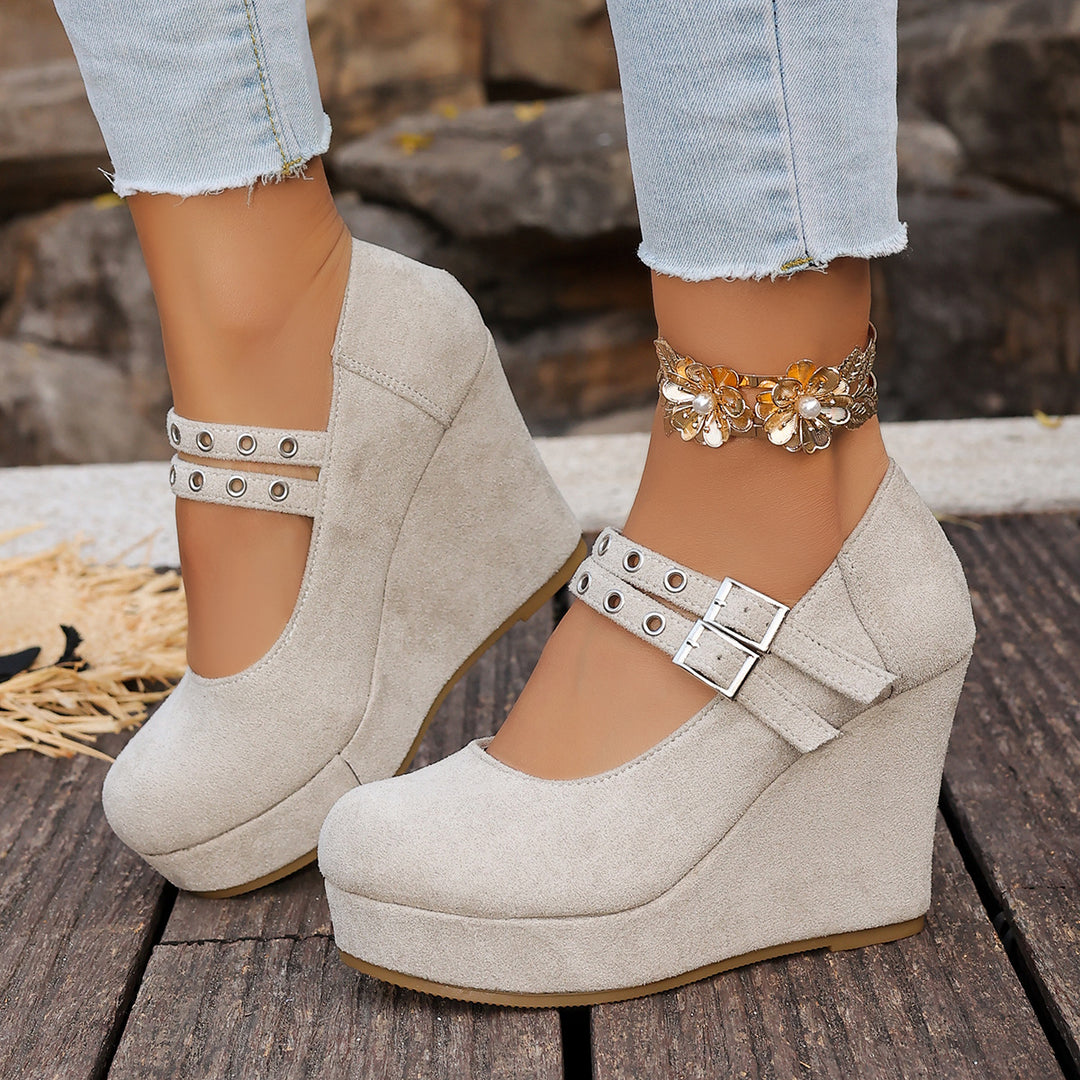 Wedge shoes with metal heart clasp
