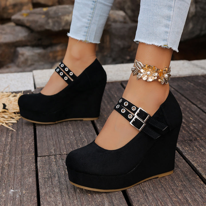 Wedge shoes with metal heart clasp