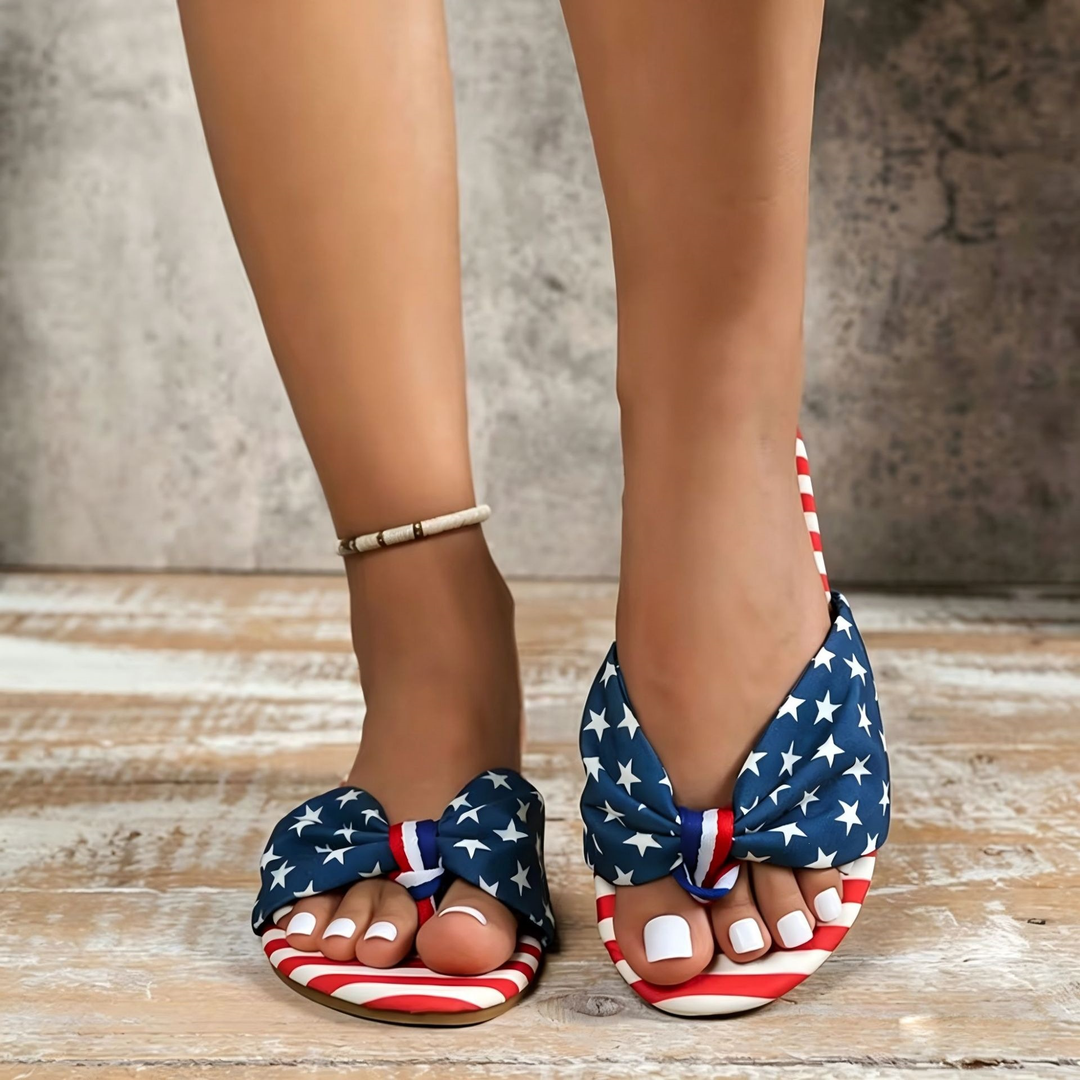 Star-and-striped knot-decorated flat sandals